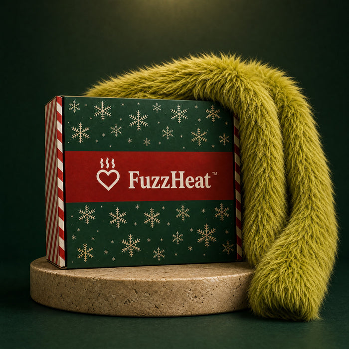 FuzzHeat gift box with the coat draped over it